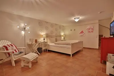 Ein Bett oder Betten in einem Zimmer der Unterkunft Sunshine-Residenz Sunshine Residenz Appartement 1 Godewind
