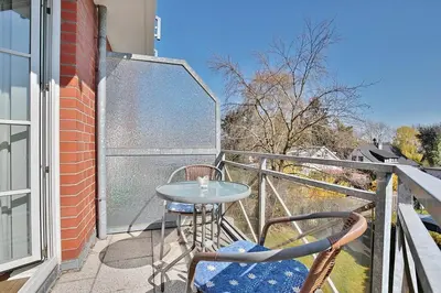 Ein Balkon oder eine Terrasse in der Unterkunft Haus Parkblick, Timmendorfer Strand Haus Parkblick Appartement 12