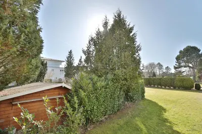 Ein Garten an der Unterkunft Fh Dornkampstraße 1 Ferienhaus Dornkampstrasse 1 Appartement 2