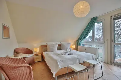 Ein Bett oder Betten in einem Zimmer der Unterkunft Domizil Strandburg Domizil Strandburg Appartement 25