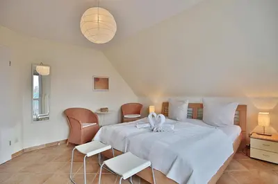 Ein Bett oder Betten in einem Zimmer der Unterkunft Domizil Strandburg Domizil Strandburg Appartement 25