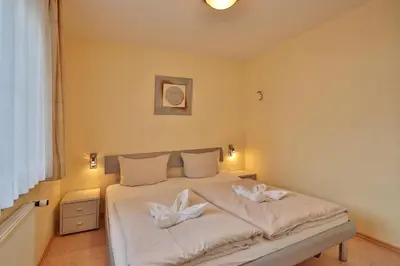Ein Bett oder Betten in einem Zimmer der Unterkunft Gorch-Fock-Park Haus 06 Gorch-Fock-Park 6 Appartement 5