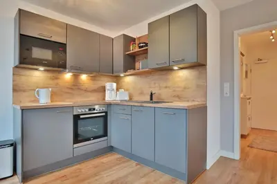 Küche/Küchenzeile in der Unterkunft Bädervilla am Höppnerweg Bädervilla am Höppnerweg Appartement 06