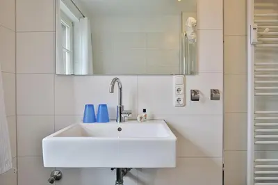 Ein Badezimmer in der Unterkunft Am Rosenhain 9 Am Rosenhain 9 Appartement 4