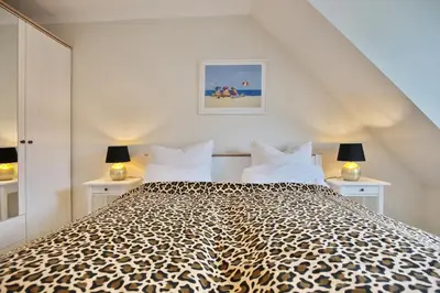 Ein Bett oder Betten in einem Zimmer der Unterkunft Wohnpark am Mühlenteich Wohnpark am Mühlenteich Appartement 17