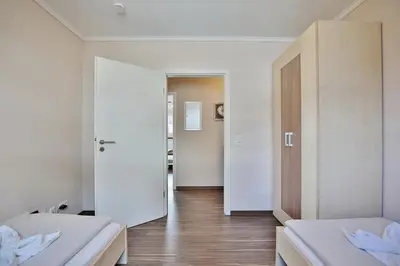 Ein Bett oder Betten in einem Zimmer der Unterkunft Residenz Herrenbruchstr Residenz Herrenbruchstraße 5 Appartement 4