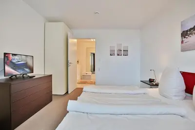 Ein Bett oder Betten in einem Zimmer der Unterkunft Villa Mér Baltique Villa Mér Baltique Appartement 13