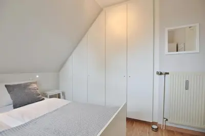 Ein Bett oder Betten in einem Zimmer der Unterkunft Am Rosenhain 6 Am Rosenhain 6 Appartement 5