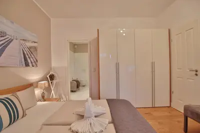 Ein Bett oder Betten in einem Zimmer der Unterkunft Villa Strandallee 164 Villa Strandallee 164 Appartement 3