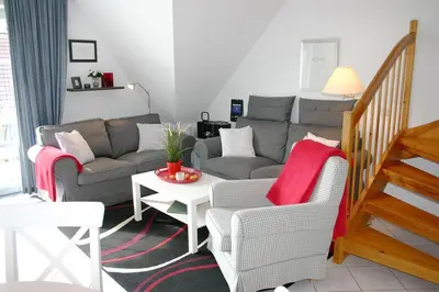 Ein Sitzbereich in der Unterkunft Gorch-Fock-Park Haus 06 Gorch-Fock-Park 6 Appartement 7