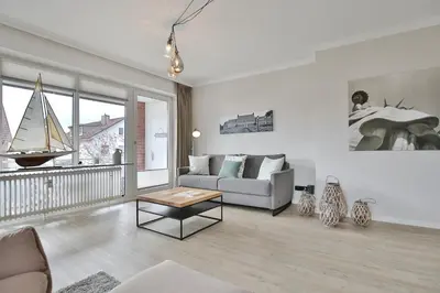 Ein Sitzbereich in der Unterkunft Am Elchgrund Eastcoast-Appartement 4