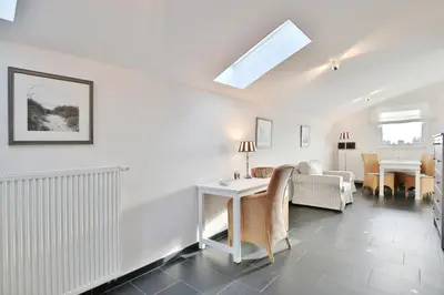 Ein Sitzbereich in der Unterkunft Penthouse am Platz Penthouse am Platz Appartement 10