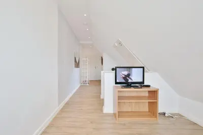 TV/Unterhaltungsangebot in der Unterkunft Baltic Lodge Baltic Lodge Appartement 6
