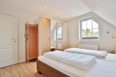 Ein Bett oder Betten in einem Zimmer der Unterkunft Baltic Lodge Baltic Lodge Appartement 6