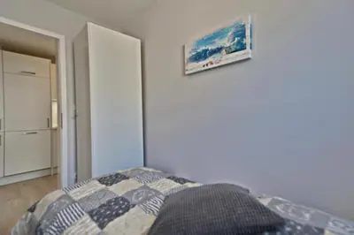 Ein Bett oder Betten in einem Zimmer der Unterkunft Haus Meeresrauschen Haus Meeresrauschen Appartement 9