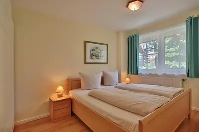 Ein Bett oder Betten in einem Zimmer der Unterkunft Gorch-Fock-Park Haus 57 Gorch-Fock-Park 57 Appartement 17 Strandvergnügen
