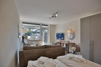 Ein Bett oder Betten in einem Zimmer der Unterkunft Villa Idyll Strandstudio Appartement 12 in der Villa Idyll