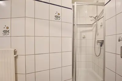 Ein Badezimmer in der Unterkunft Ferienanlage Bergstraße 62 Ferienhaus Bergstraße 62 Appartement 17
