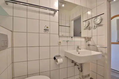 Ein Badezimmer in der Unterkunft Ferienanlage Bergstraße 62 Ferienhaus Bergstraße 62 Appartement 17