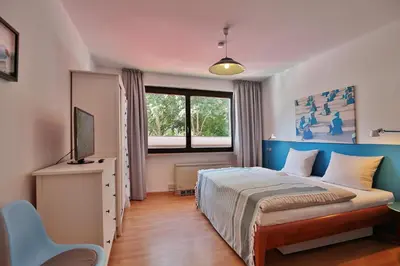 Ein Bett oder Betten in einem Zimmer der Unterkunft Haus Kastanienallee Strandkoje