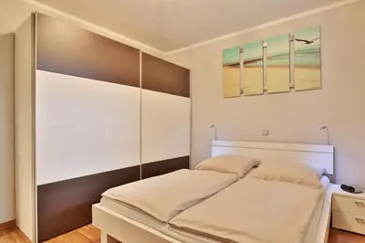 Ein Bett oder Betten in einem Zimmer der Unterkunft Domizil am Meer Domizil am Meer Appartement 20