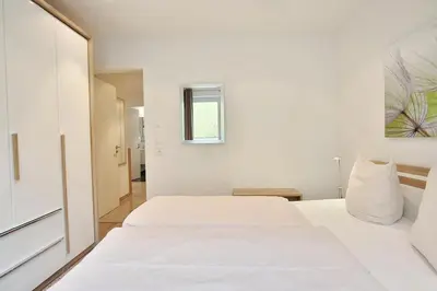 Ein Bett oder Betten in einem Zimmer der Unterkunft Parkresidenz Bergstraße 52 Parkresidenz Bergstraße 52 Appartement 2