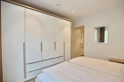 Ein Bett oder Betten in einem Zimmer der Unterkunft Parkresidenz Bergstraße 52 Parkresidenz Bergstraße 52 Appartement 2