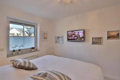 Ein Bett oder Betten in einem Zimmer der Unterkunft Kurparkresidenz-Timmendorfer Strand Kurparkresidenz-Timmendorfer Strand Appartement 01