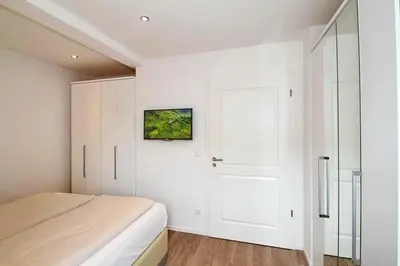 Ein Bett oder Betten in einem Zimmer der Unterkunft Residenz am Timmendorfer Platz Residenz am Timmendorfer Platz Appartement 3
