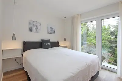 Ein Bett oder Betten in einem Zimmer der Unterkunft Villa Stern Villa Stern Appartement 08