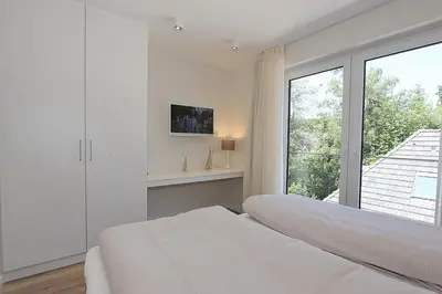 Ein Bett oder Betten in einem Zimmer der Unterkunft Villa Stern Villa Stern Appartement 09