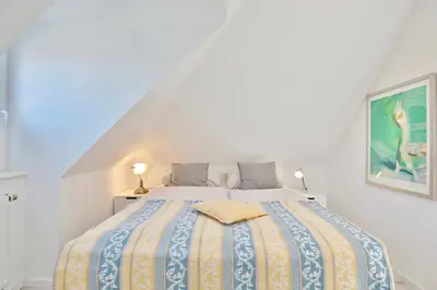 Ein Bett oder Betten in einem Zimmer der Unterkunft Haus Kurparkblick Haus Kurparkblick Appartement 11