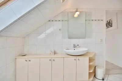 Ein Badezimmer in der Unterkunft Haus Kurparkblick Haus Kurparkblick Appartement 11