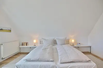 Ein Bett oder Betten in einem Zimmer der Unterkunft Gorch-Fock-Straße 20a Gorch-Fock-Straße 20a Appartement 3