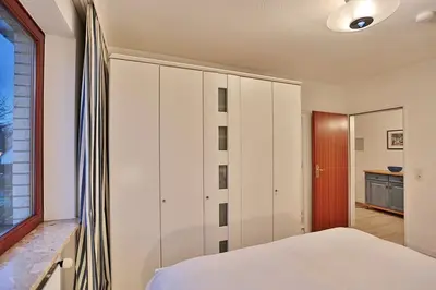 Ein Bett oder Betten in einem Zimmer der Unterkunft Haus Kastanienallee 3 Haus Kastanienallee 3 Appartement 6