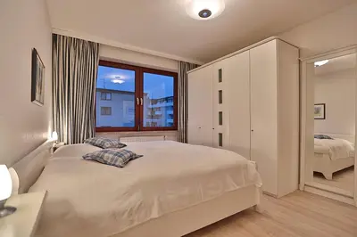 Ein Bett oder Betten in einem Zimmer der Unterkunft Haus Kastanienallee 3 Haus Kastanienallee 3 Appartement 6