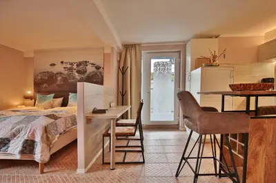 Ein Bett oder Betten in einem Zimmer der Unterkunft Ferienbungalow Erlenweg 20 Erlenweg 20 Appartement 3 Niendorf Ostsee