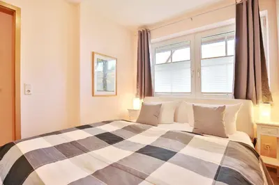 Ein Bett oder Betten in einem Zimmer der Unterkunft Gorch-Fock-Park Haus 57 Gorch-Fock-Park 57 Appartement 13