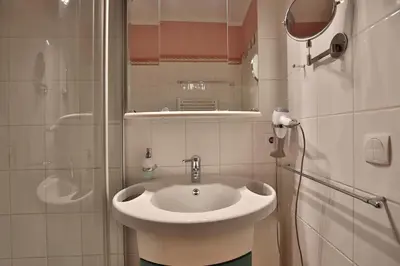 Ein Badezimmer in der Unterkunft Wohnpark Niendorf Wohnpark Niendorf Appartement 05
