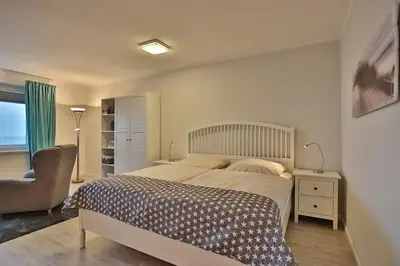 Ein Bett oder Betten in einem Zimmer der Unterkunft Haus Seebrücke Haus Seebrücke Appartement 08