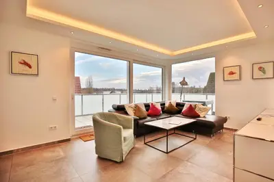 Ein Sitzbereich in der Unterkunft Haus Wolburgstraße 1 Haus Wolburgstraße 1a Penthouse Haifisch Appartement 5