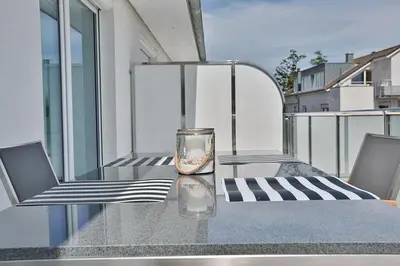 Ein Balkon oder eine Terrasse in der Unterkunft Haus Wolburgstraße 1 Haus Wolburgstraße 1a Penthouse Haifisch Appartement 5