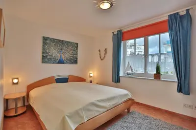 Ein Bett oder Betten in einem Zimmer der Unterkunft Hanseaten Residenz Hanseaten-Residenz Appartement 8