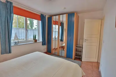 Ein Bett oder Betten in einem Zimmer der Unterkunft Hanseaten Residenz Hanseaten-Residenz Appartement 8