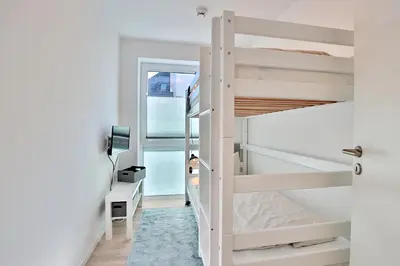 Ein Bett oder Betten in einem Zimmer der Unterkunft Haus Ostseedüne Haus Ostseedüne Appartement 7