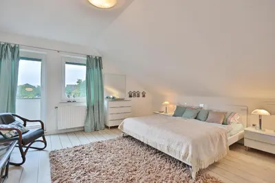 Ein Bett oder Betten in einem Zimmer der Unterkunft Haus an der Strandallee 112 Haus an der Strandallee 112 Appartement 8