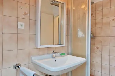 Ein Badezimmer in der Unterkunft Haus an der Strandallee 112 Haus an der Strandallee 112 Appartement 8