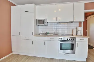 Küche/Küchenzeile in der Unterkunft Strandvilla Strandvilla Appartement 6
