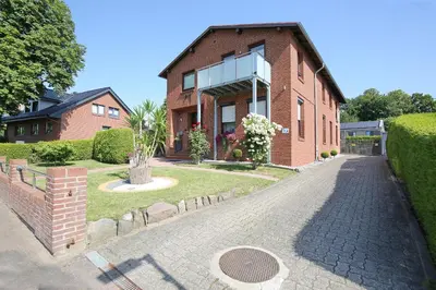 Ein Garten an der Unterkunft Ferienhaus Brandt Ferienhaus Brandt Appartement 3 Möwenkieker