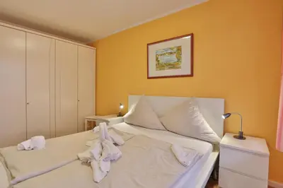 Ein Bett oder Betten in einem Zimmer der Unterkunft Haus Windrose Windrose Appartement 11